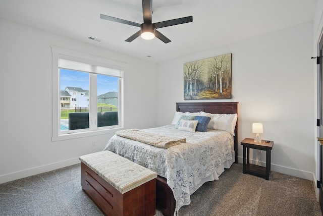 2216 Timberview Dr, Norwalk, IA 50211 - bedroom featuring carpet, baseboards, and ceiling fan