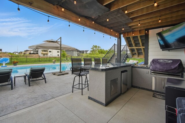 2216 Timberview Dr, Norwalk, IA 50211 - view of patio with stairway and exterior kitchen