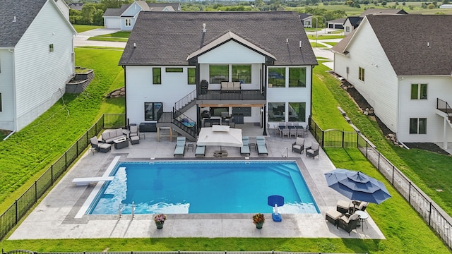 2216 Timberview Dr, Norwalk, IA 50211 - back of house featuring an outdoor living space, roof with shingles, a patio area, stairway, and outdoor dining area