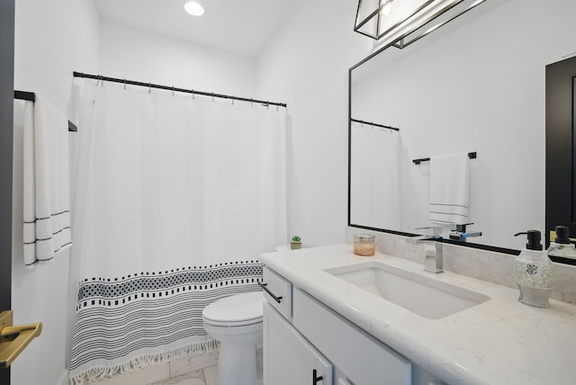 2216 Timberview Dr, Norwalk, IA 50211 - bathroom featuring vanity, toilet, marble finish floors, recessed lighting, and curtained shower