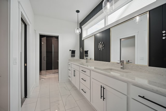 2216 Timberview Dr, Norwalk, IA 50211 - full bathroom with double vanity and marble finish floors