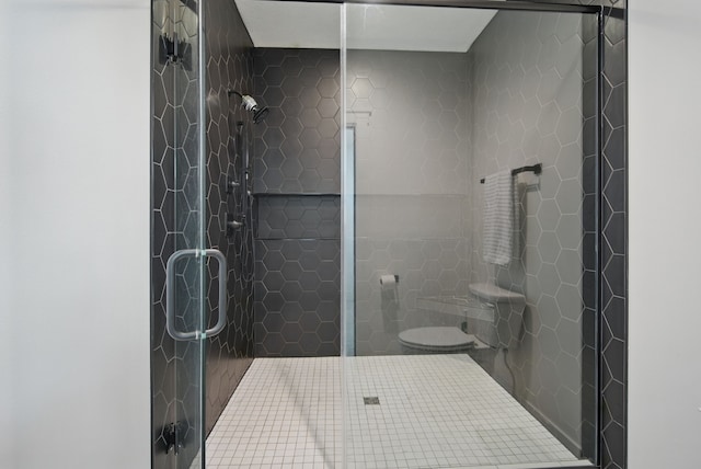2216 Timberview Dr, Norwalk, IA 50211 - bathroom featuring a shower stall and toilet