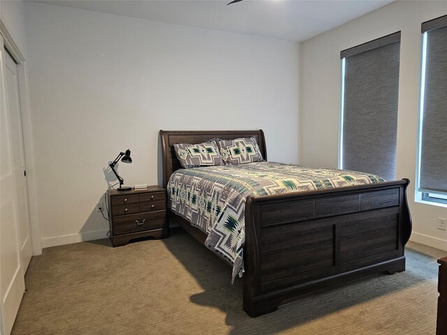 924 12th St, Des Moines, IA 50309 - bedroom with carpet and baseboards