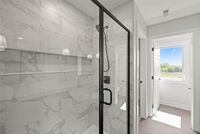 9814 Watermeadow Cir, Johnston, IA 50131 - bathroom with a marble finish shower