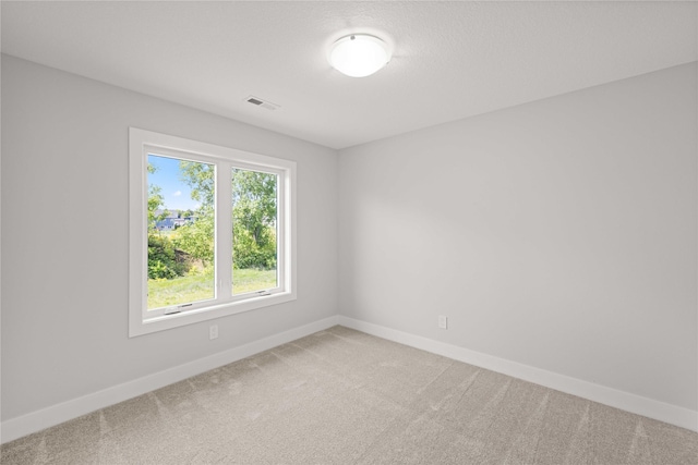 9814 Watermeadow Cir, Johnston, IA 50131 - spare room featuring light colored carpet and baseboards