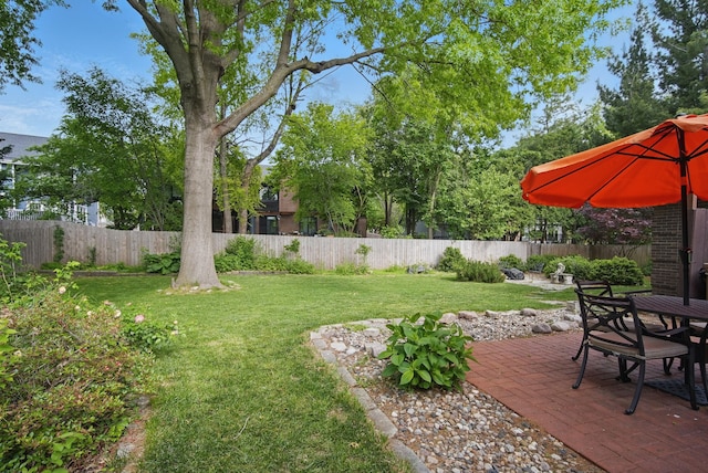 711 36th St, West Des Moines, IA 50265 - view of yard with a patio area and outdoor dining area