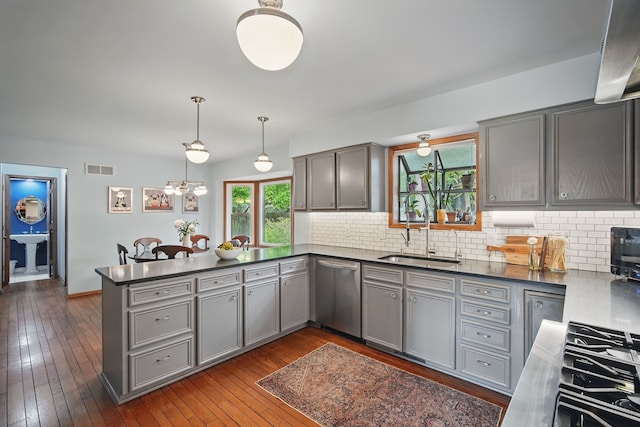 711 36th St, West Des Moines, IA 50265 - kitchen with gray cabinets, stainless steel dishwasher, and a sink