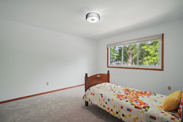 711 36th St, West Des Moines, IA 50265 - bedroom featuring carpet flooring and baseboards