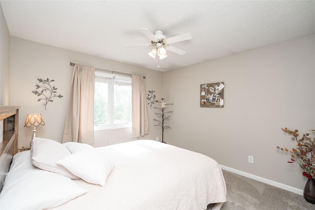 6640 Monticello Ct, Johnston, IA 50131 - bedroom with carpet, baseboards, and ceiling fan