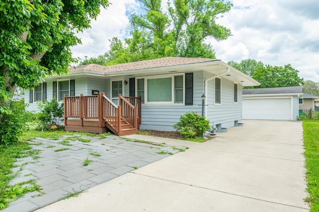 3214 Brinkwood Rd, Des Moines, IA 50310 - ranch-style house with an outdoor structure and a detached garage