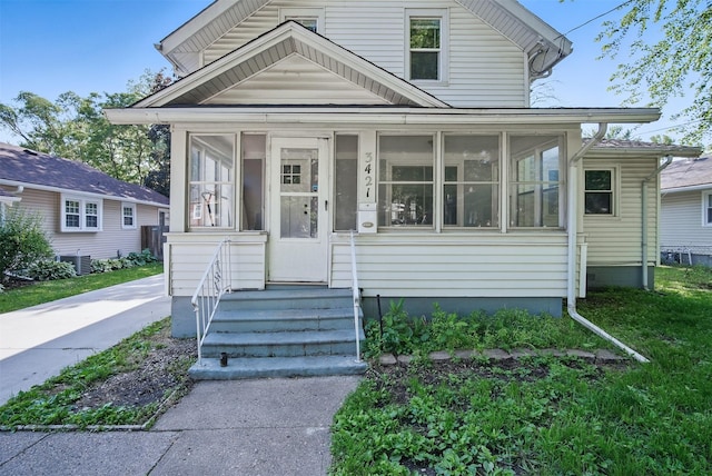 3421 Amherst St, Des Moines, IA 50313 - view of front facade featuring a sunroom