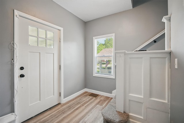 3421 Amherst St, Des Moines, IA 50313 - entrance foyer with light wood-type flooring and baseboards