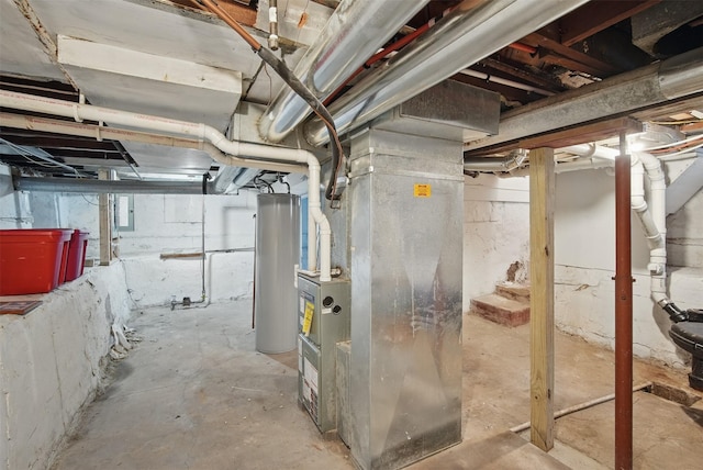 3421 Amherst St, Des Moines, IA 50313 - unfinished basement with water heater and heating unit