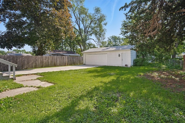 3421 Amherst St, Des Moines, IA 50313 - view of yard featuring an outbuilding and a garage