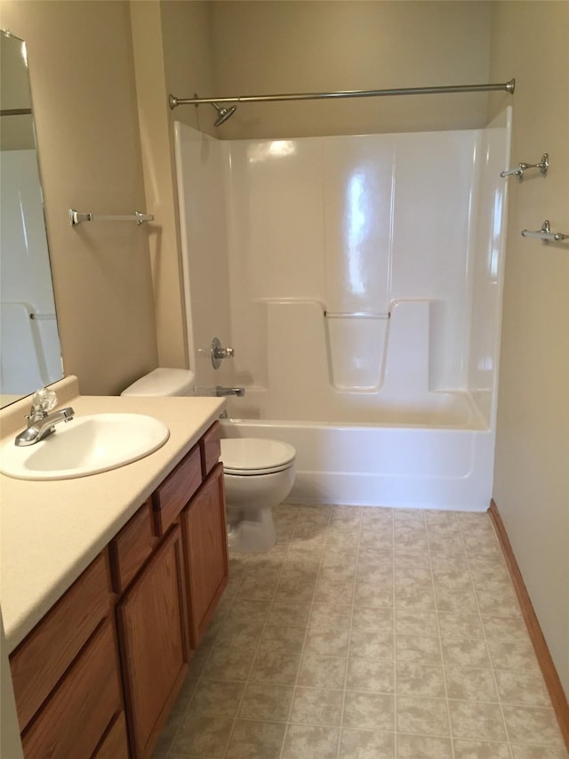 1740 SE La Grant Pkwy Unit 18, Waukee, IA 50263 - bathroom featuring vanity, toilet, and  shower combination