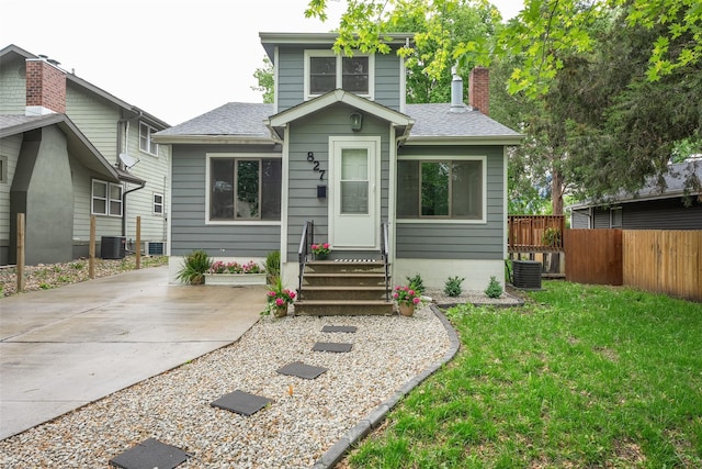 827 40th Pl, Des Moines, IA 50312 - american foursquare style home with a chimney and roof with shingles