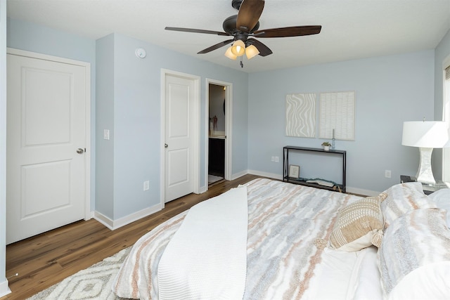 196 79th St, West Des Moines, IA 50266 - bedroom with wood finished floors, baseboards, and ceiling fan