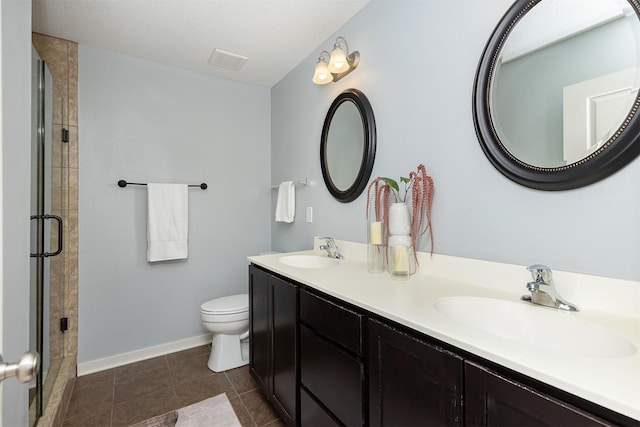 196 79th St, West Des Moines, IA 50266 - full bathroom with toilet, double vanity, a shower stall, baseboards, and tile patterned flooring