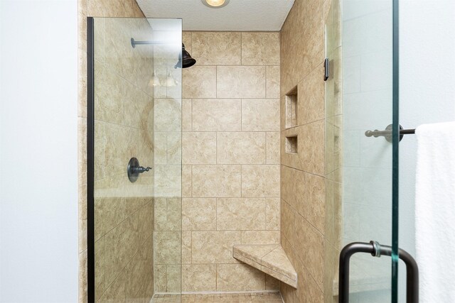 196 79th St, West Des Moines, IA 50266 - bathroom featuring a stall shower