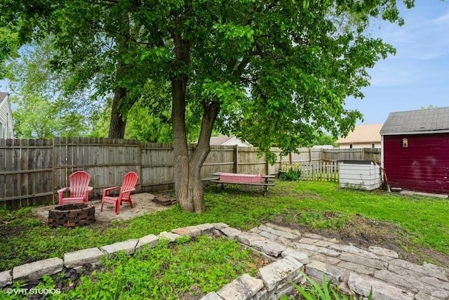 2638 Capitol Ave, Des Moines, IA 50317 - view of yard with an outdoor fire pit
