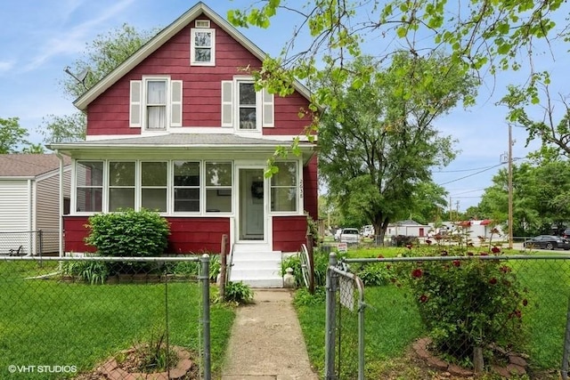 2638 Capitol Ave, Des Moines, IA 50317 - view of front of house with entry steps and a sunroom