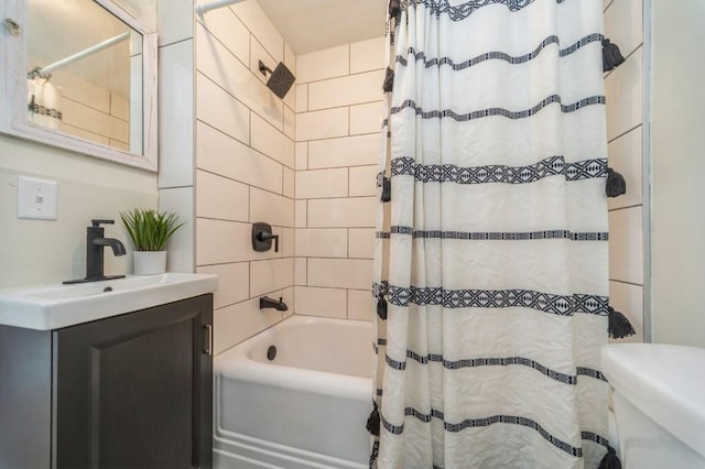 212 Nile Kinnick Dr N, Adel, IA 50003 - bathroom featuring shower / tub combo, toilet, and vanity