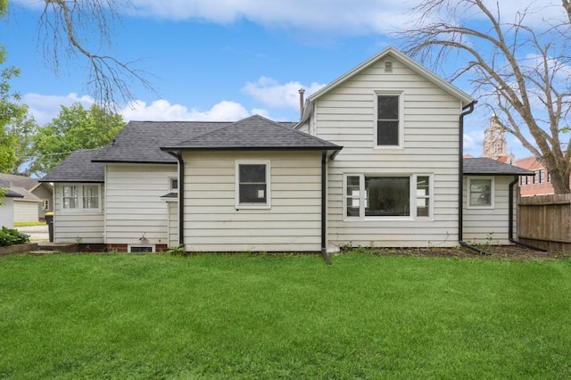212 Nile Kinnick Dr N, Adel, IA 50003 - rear view of house featuring roof with shingles