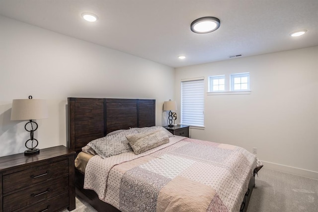 4724 162nd St, Urbandale, IA 50323 - bedroom featuring light colored carpet, baseboards, and recessed lighting