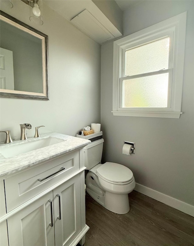 1541 42nd St, Des Moines, IA 50311 - bathroom featuring vanity and wood finished floors
