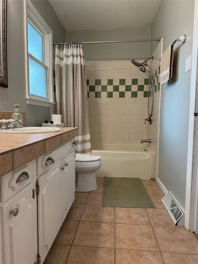 1541 42nd St, Des Moines, IA 50311 - bathroom featuring vanity, tile patterned floors, and shower / tub combo