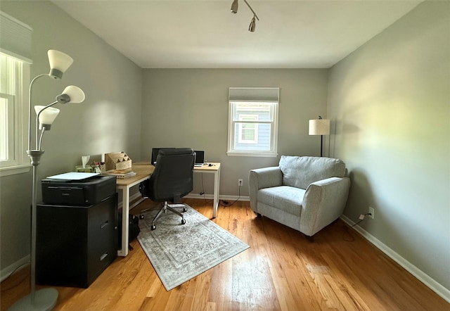 1541 42nd St, Des Moines, IA 50311 - office area featuring light wood-style floors and baseboards