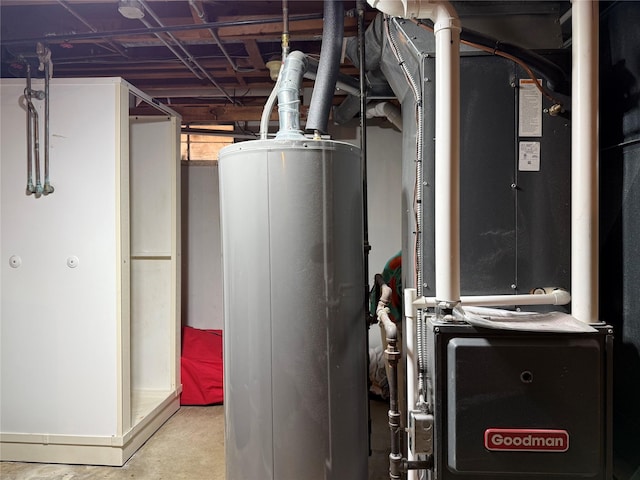 1541 42nd St, Des Moines, IA 50311 - utility room featuring gas water heater and heating unit