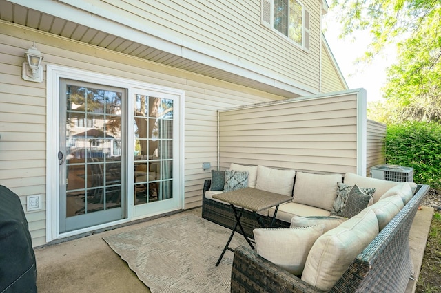 5221 Village Run Ave Unit 402, Des Moines, IA 50317 - view of patio / terrace with an outdoor living space and cooling unit