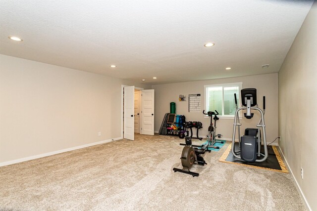 513 Walnut Dr, Huxley, IA 50124 - workout area featuring carpet floors, recessed lighting, and baseboards