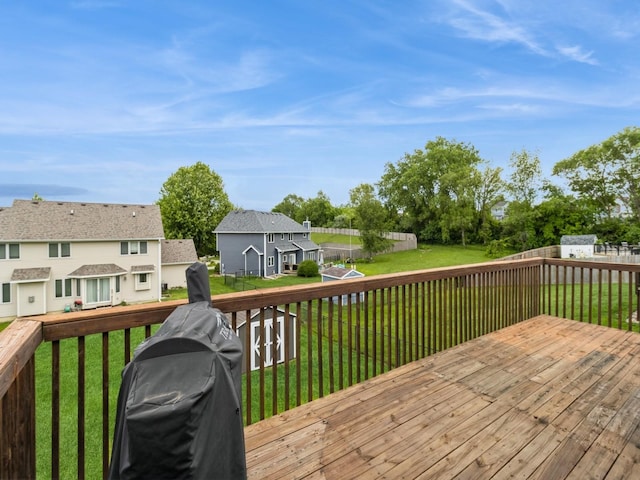5213 SE 30th St, Des Moines, IA 50320 - deck featuring a yard, a residential view, a storage shed, and a grill