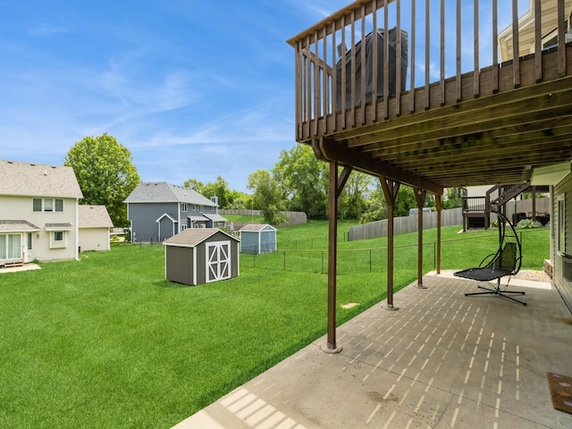 5213 SE 30th St, Des Moines, IA 50320 - view of yard featuring a patio and a deck