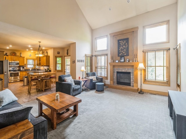 6818 Jules Verne Ct, Johnston, IA 50131 - living room with high vaulted ceiling and a fireplace