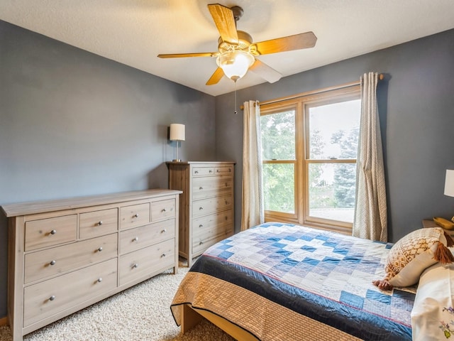 6818 Jules Verne Ct, Johnston, IA 50131 - bedroom with light colored carpet and a ceiling fan