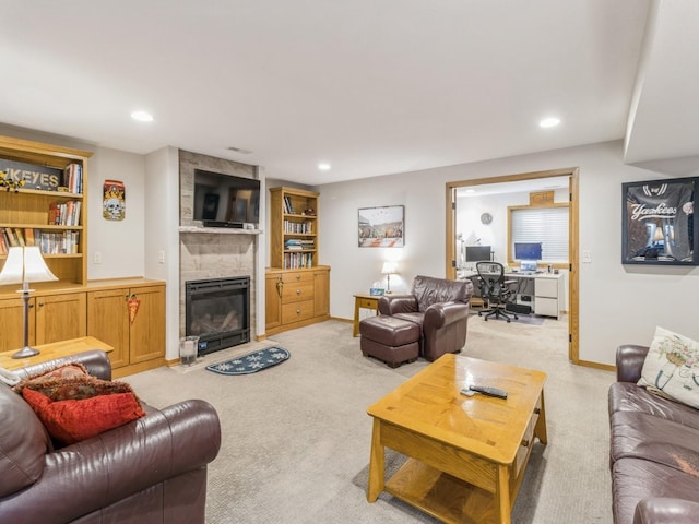 6818 Jules Verne Ct, Johnston, IA 50131 - living area with light colored carpet, a fireplace, an office area, recessed lighting, and built in features
