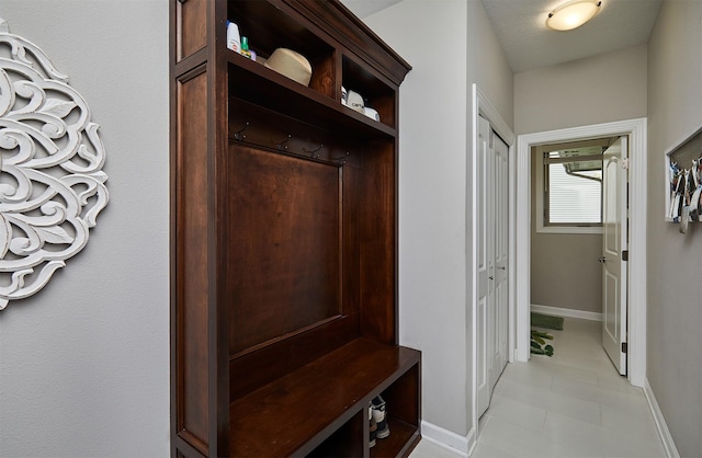 1880 Brodie St, Waukee, IA 50263 - mudroom featuring baseboards