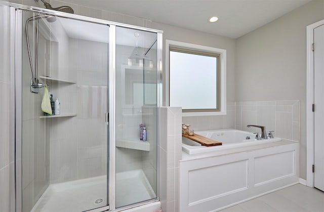 1880 Brodie St, Waukee, IA 50263 - full bath with a garden tub, a shower stall, recessed lighting, and tile patterned floors