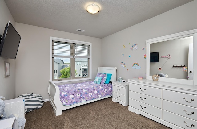 1880 Brodie St, Waukee, IA 50263 - carpeted bedroom featuring a textured ceiling