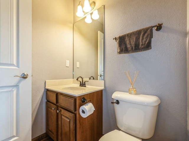 8305 Century Dr, West Des Moines, IA 50266 - bathroom featuring vanity and toilet