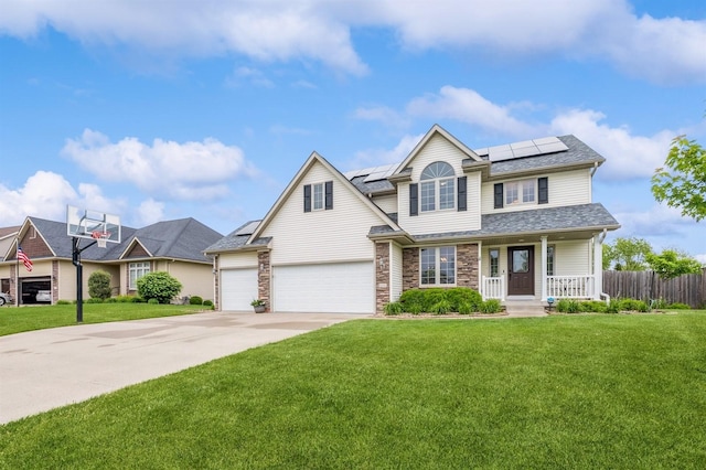 8305 Century Dr, West Des Moines, IA 50266 - traditional-style house featuring a porch, concrete driveway, solar panels, stone siding, and a garage
