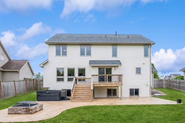 8305 Century Dr, West Des Moines, IA 50266 - back of property featuring a patio area, a deck, a fenced backyard, and a hot tub