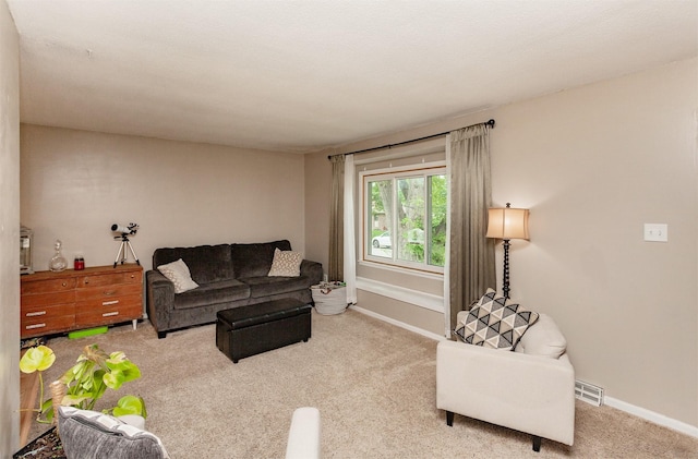 4006 67th St, Urbandale, IA 50322 - living room featuring carpet floors and baseboards