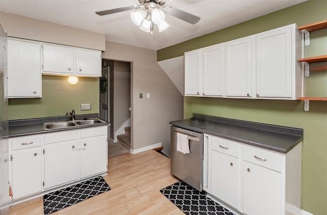 4006 67th St, Urbandale, IA 50322 - kitchen featuring a sink, open shelves, dishwasher, dark countertops, and white cabinetry