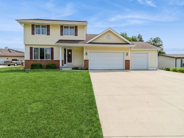 1506 W 17th St S, Newton, IA 50208 - view of front of house featuring a garage, concrete driveway, a front lawn, and brick siding