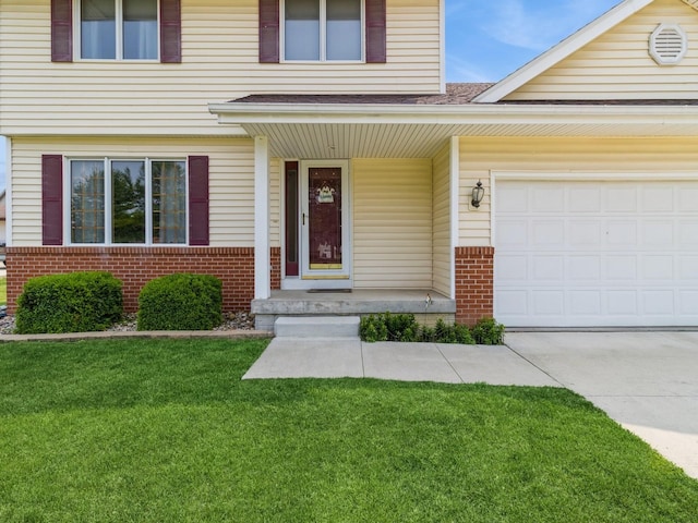 1506 W 17th St S, Newton, IA 50208 - view of front of house featuring brick siding, a front yard, an attached garage, a porch, and driveway