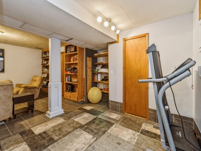 1506 W 17th St S, Newton, IA 50208 - workout room with tile patterned floors